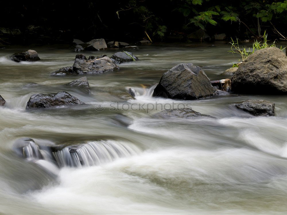 Similar – Stones in the riverbed