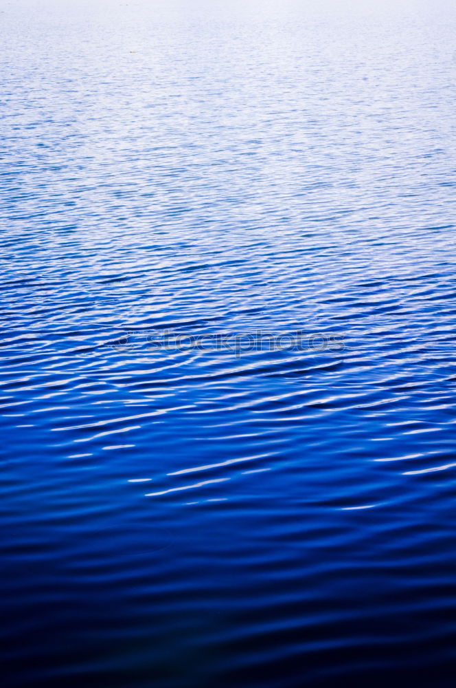 Similar – Ripple of blue water