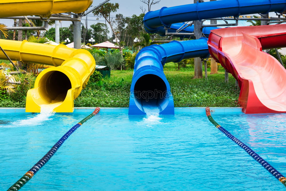 Similar – colorful Pedalos on the beach sand