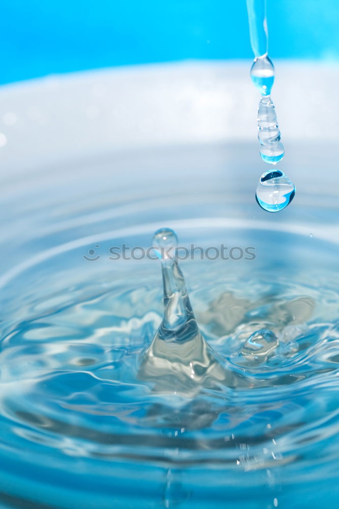 Similar – Woman’s hands holding a cup of clean sparkling water