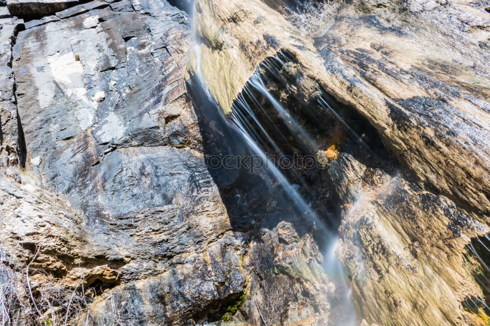 Similar – Waterfall in the belesar reservoir in greenish tones