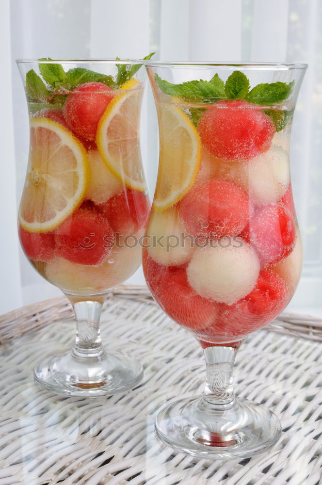 Similar – Image, Stock Photo Summer refreshment with orange and strawberries