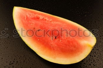 Similar – Half of the watermelon