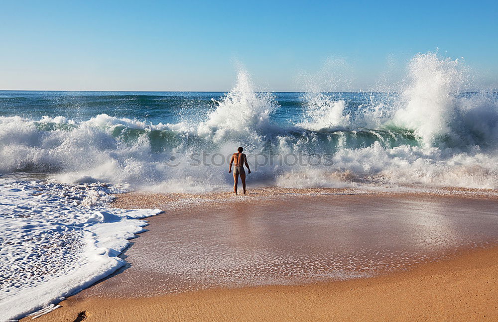 Similar – Bathing at the beach of Nazaré I