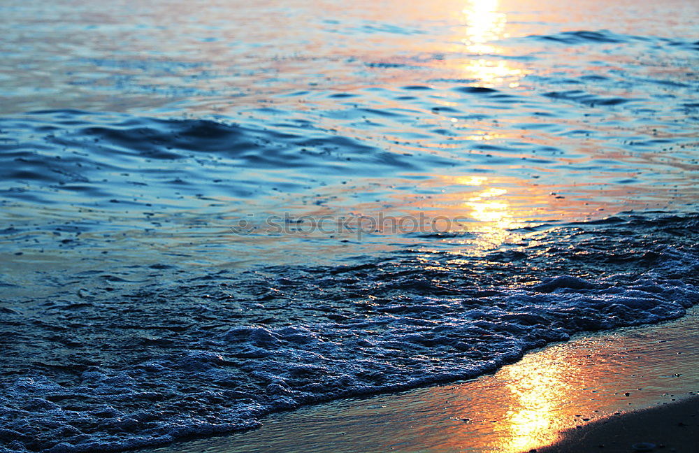 Similar – Landscape on the beach with sea, horizon, sky and sunlight