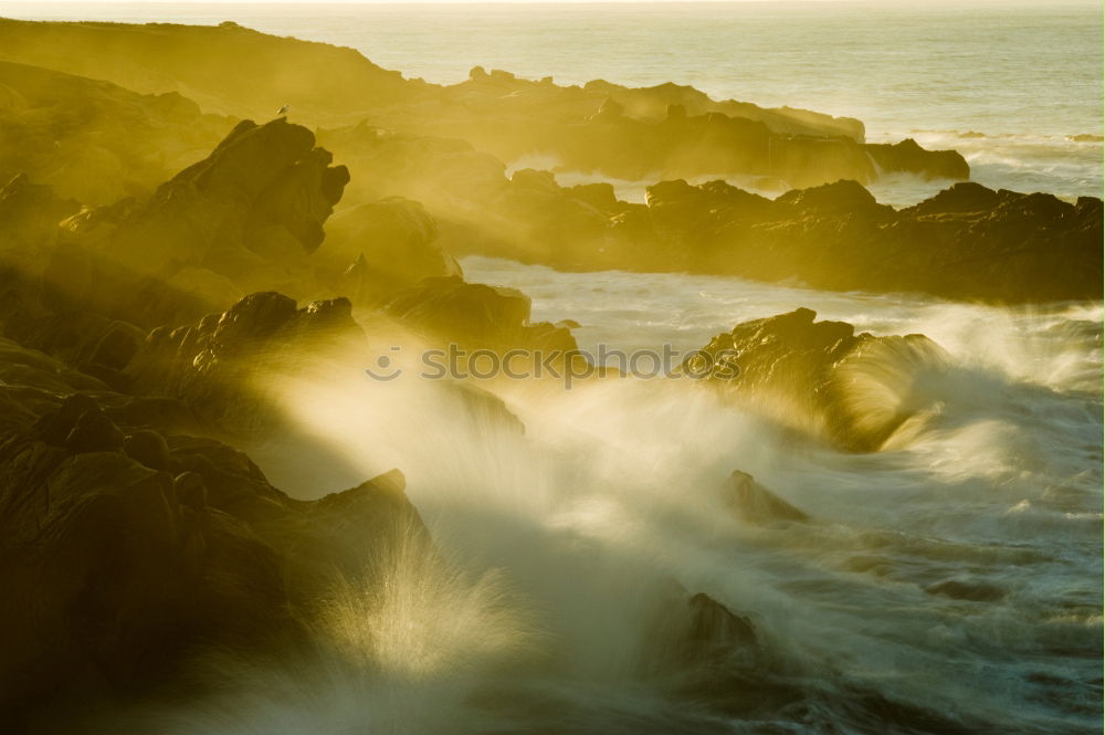 Similar – Image, Stock Photo Liapades Beach, evening atmosphere on a stony beach, waves breaking on a rock behind which the sun is setting