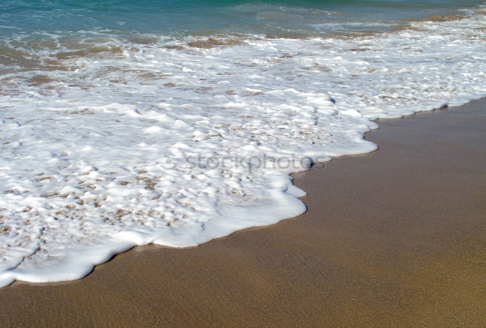 Similar – Steg mit Sonnenschutzdach am Strand bei stürmischer See