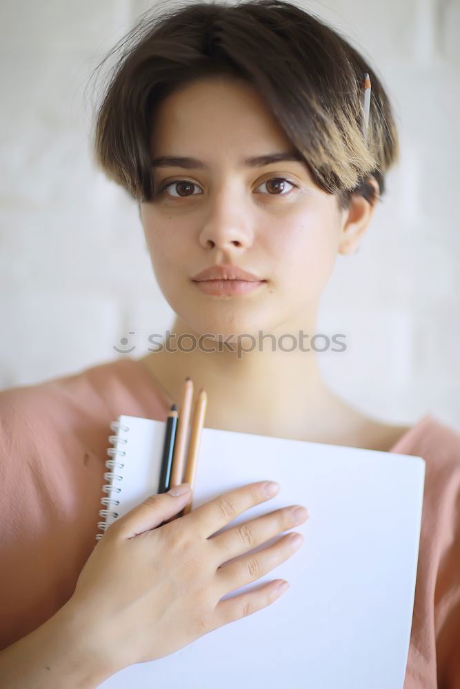 Crop woman eating sushi