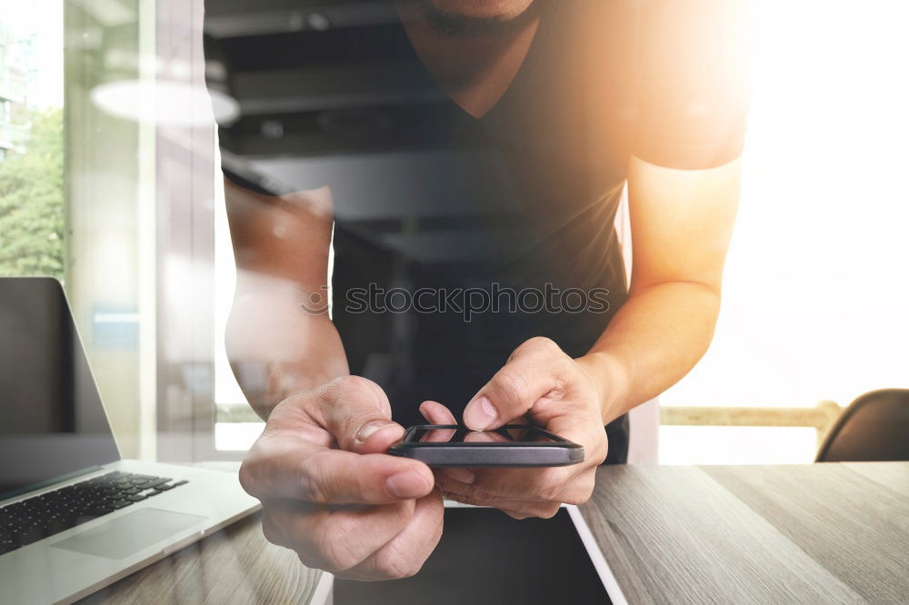 Similar – Woman with cup and smartphone in outside cafe