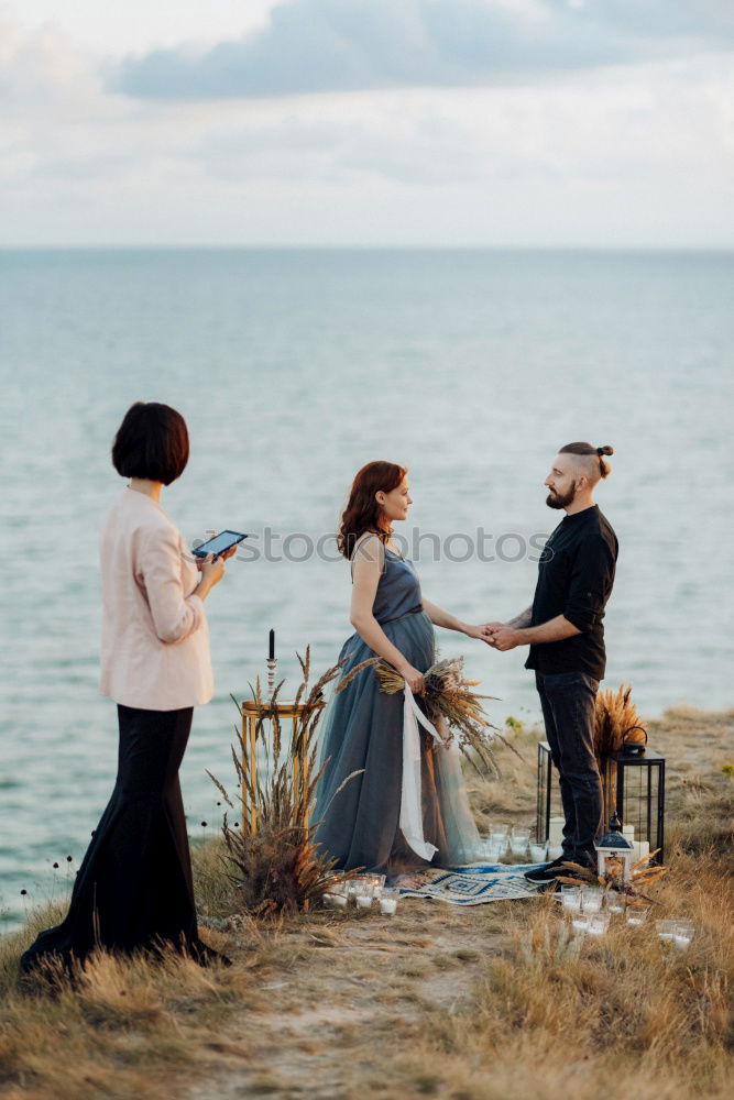 Similar – Image, Stock Photo Group of friends hanging out at beach in summer