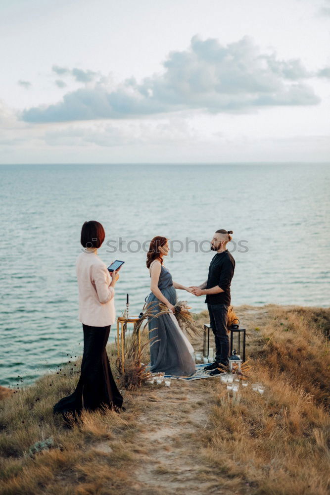 Similar – Image, Stock Photo Group of friends hanging out at beach in summer