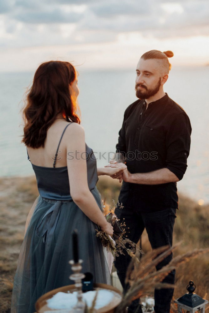 Similar – Image, Stock Photo Couple embracing on evening street