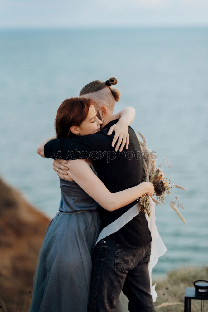 Similar – Women standing at lake