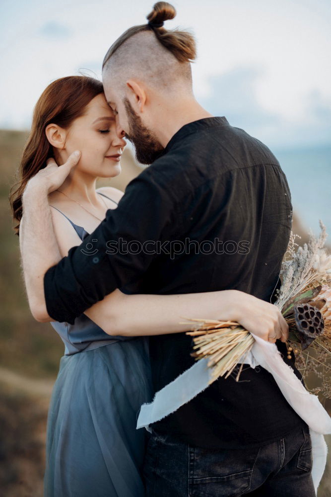 Similar – Image, Stock Photo Happy couple hugging and kissing near tree in park