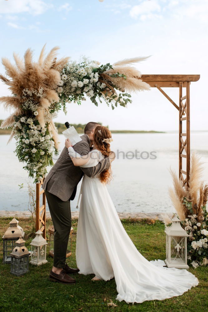 Similar – Image, Stock Photo Sensual wedding couple kissing on shoreline