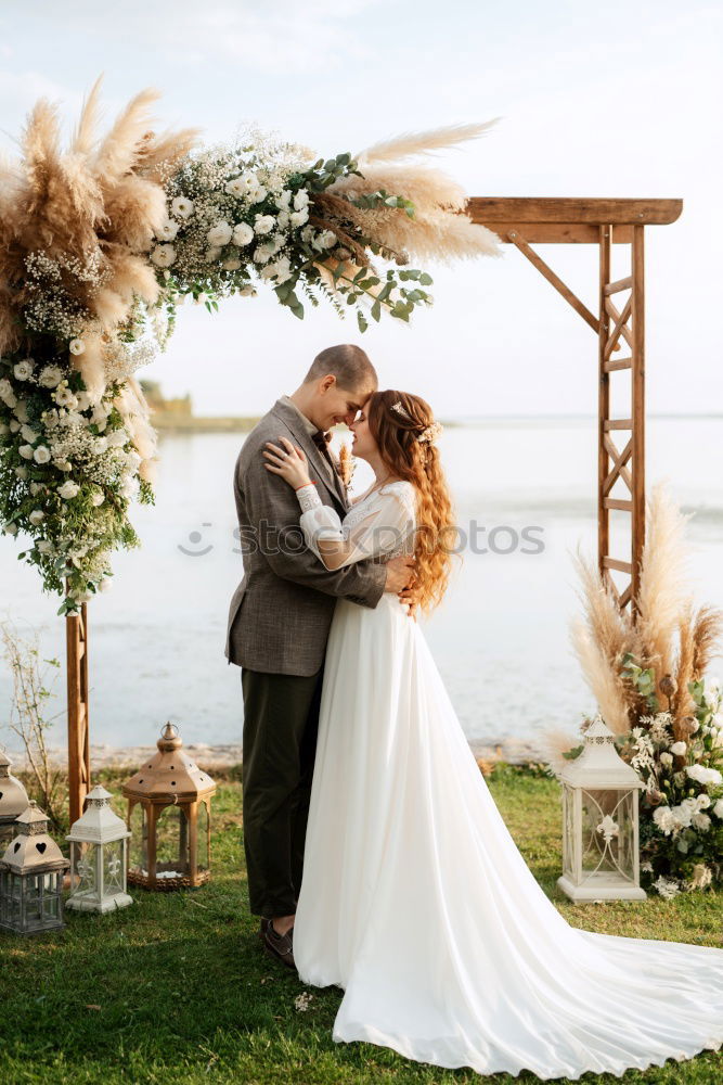 Similar – Image, Stock Photo Sensual wedding couple kissing on shoreline