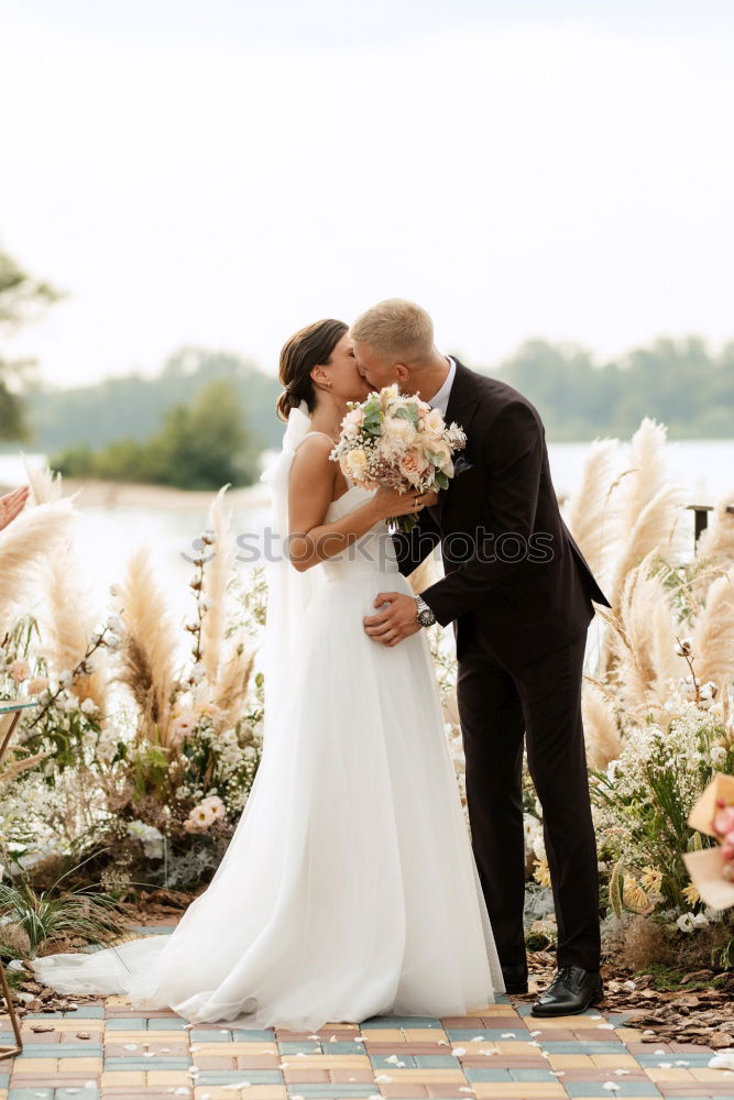 Similar – Newly married couple leaving the church.