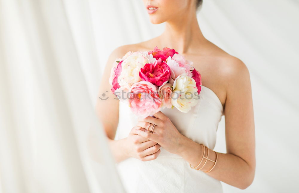 Image, Stock Photo Bride trying on wedding dress.