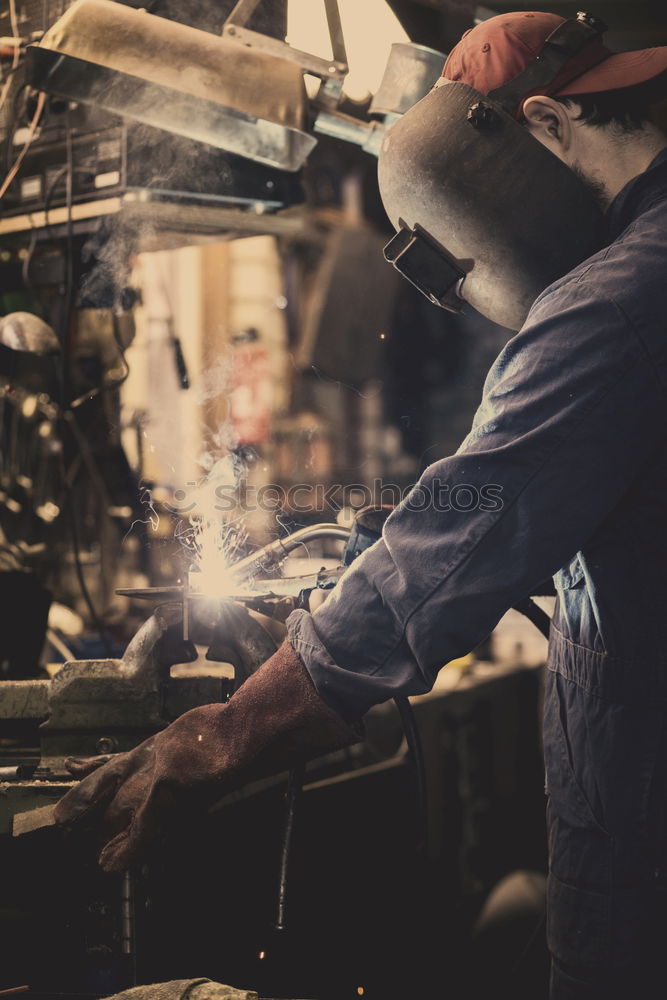 Similar – Image, Stock Photo Professional Mechanic welding.