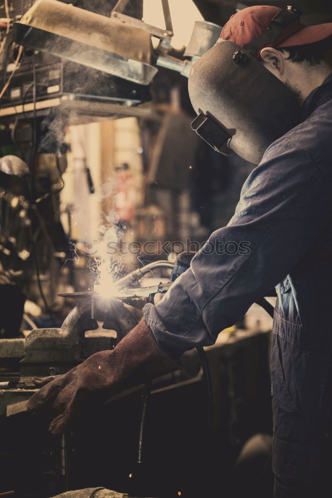 Similar – Image, Stock Photo Professional Mechanic welding.