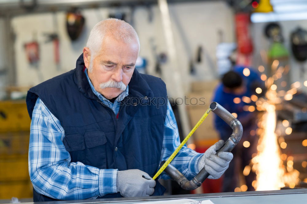 Similar – Professional carpenter at work.