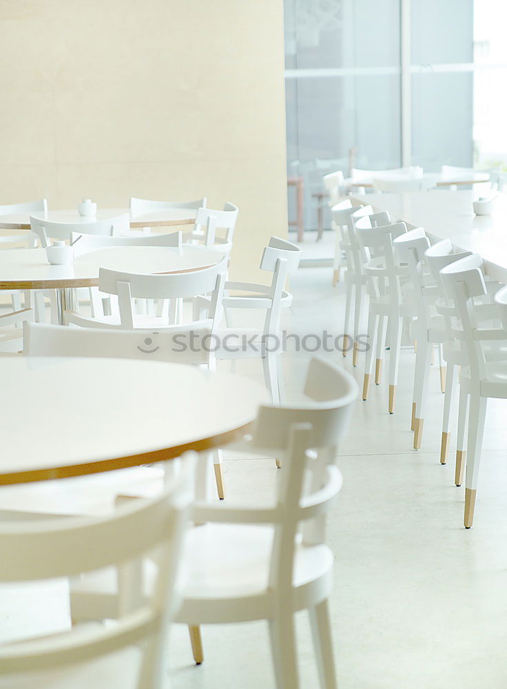 Similar – Image, Stock Photo empty deserted street cafe or outdoor restaurant tables with multicolored chairs