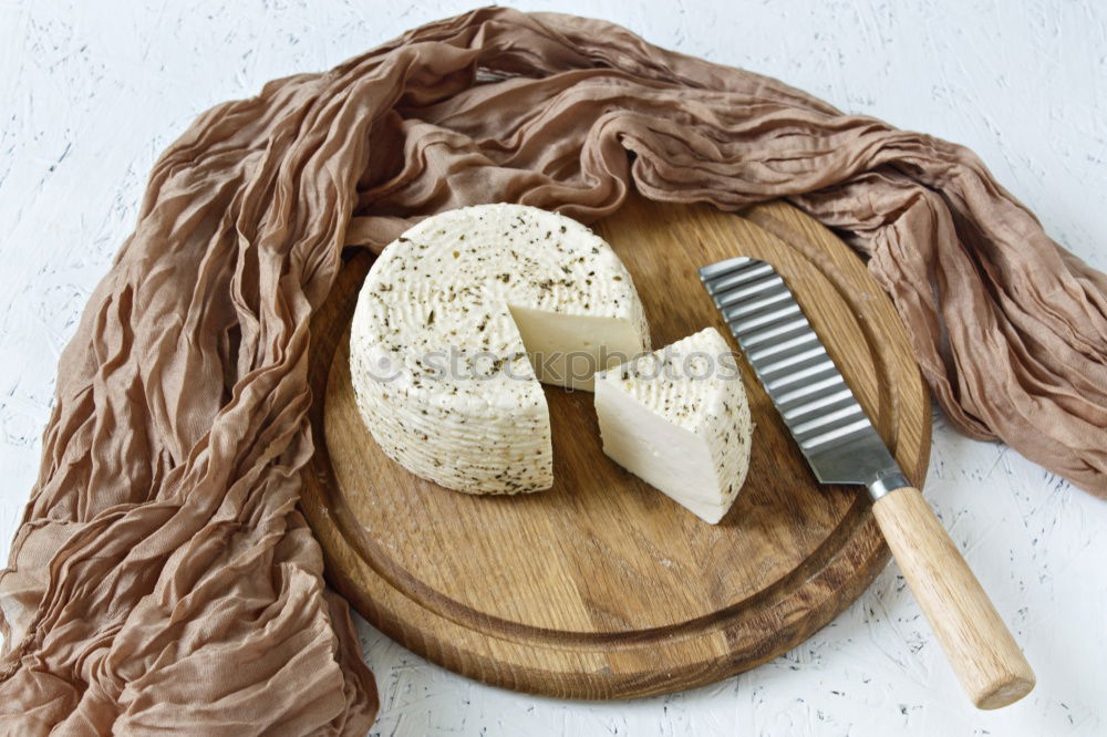 Similar – Semi-cured sheep cheese Villarejo Rosemary