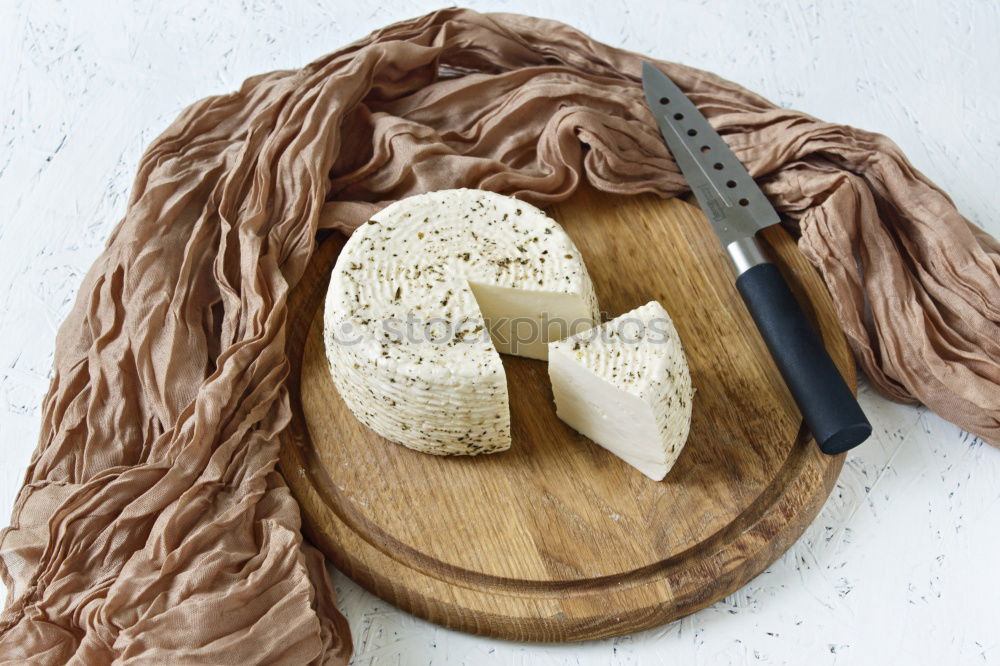 Similar – Semi-cured sheep cheese Villarejo Rosemary