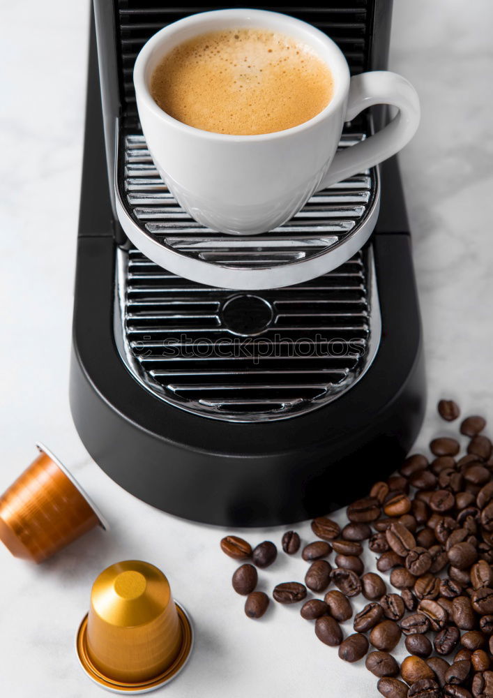 Similar – Glass coffeepot, white porcelain filter, light brown filter paper and dark brown continuous bubble forming coffee, apple, egg in wooden egg cup, white cup, corn waffles, white table in front of grey wall in the morning light.