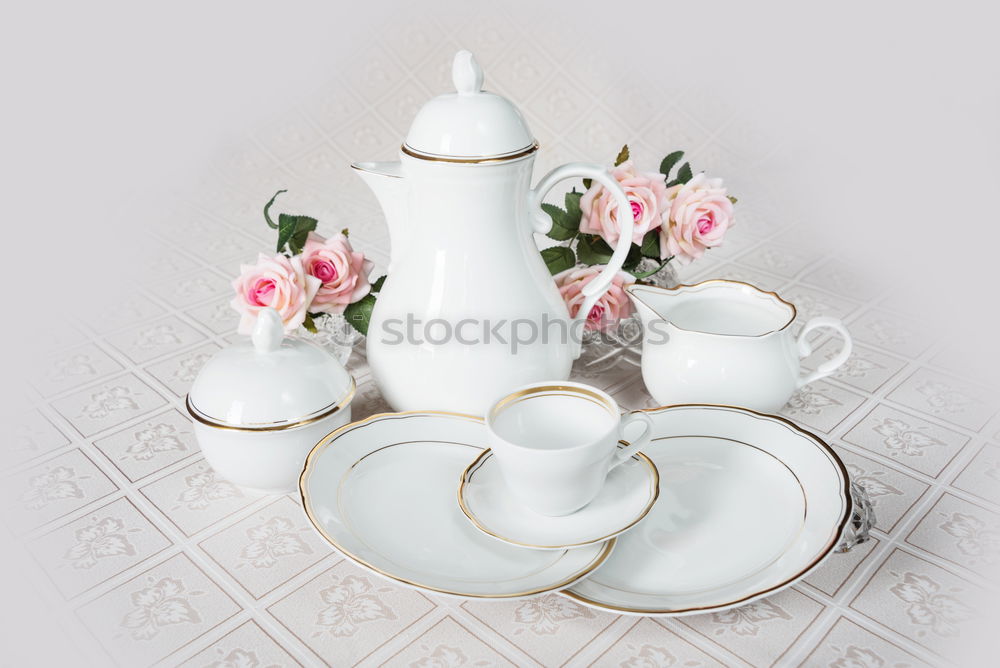 Similar – Crockery arrangement with flower