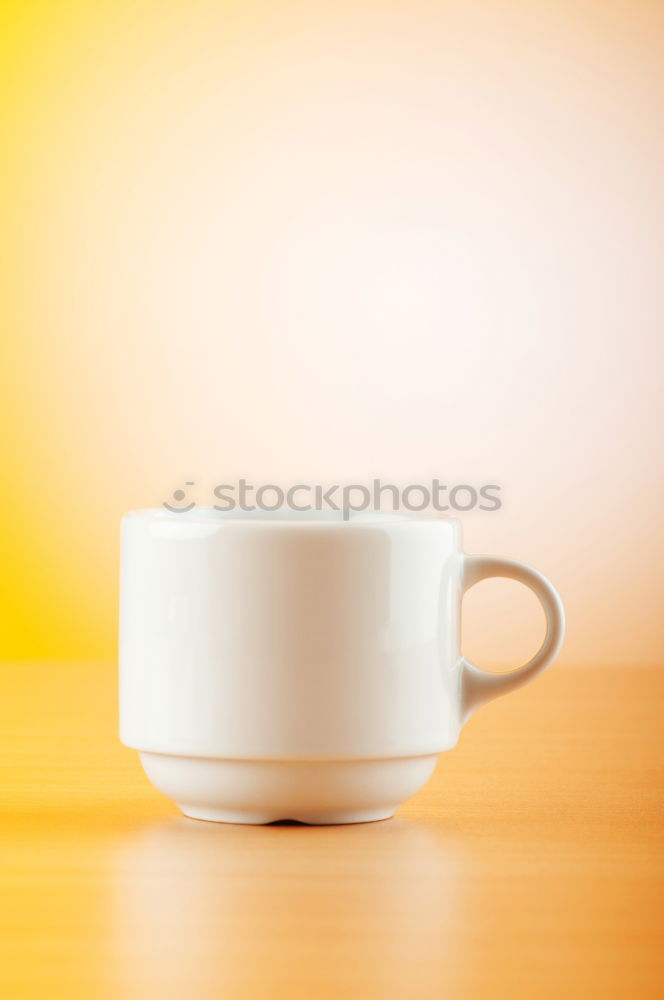 Similar – Image, Stock Photo Coffee cup and saucer with gold decoration stand on a wooden table