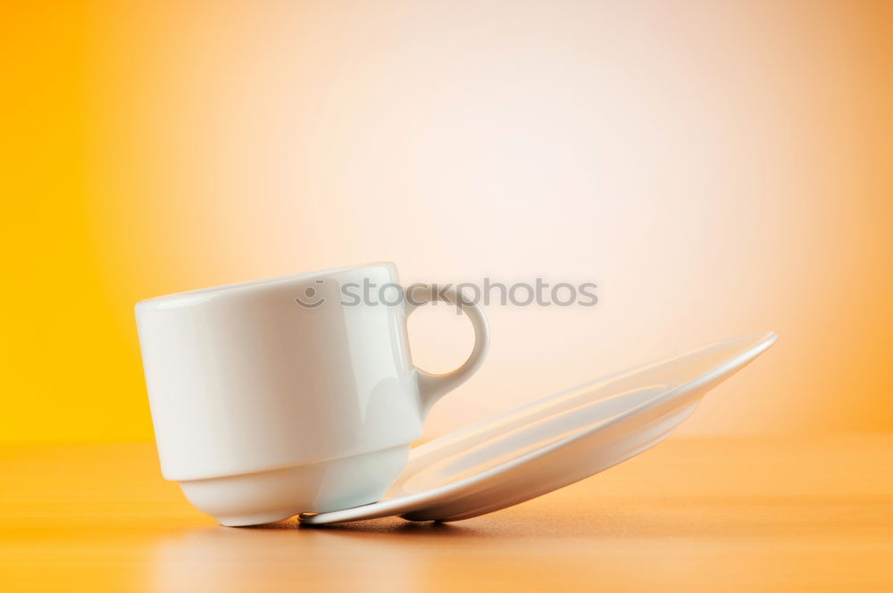 Similar – Image, Stock Photo Turquoise coffee mug held by hands of young woman in yellow pigtail sweater