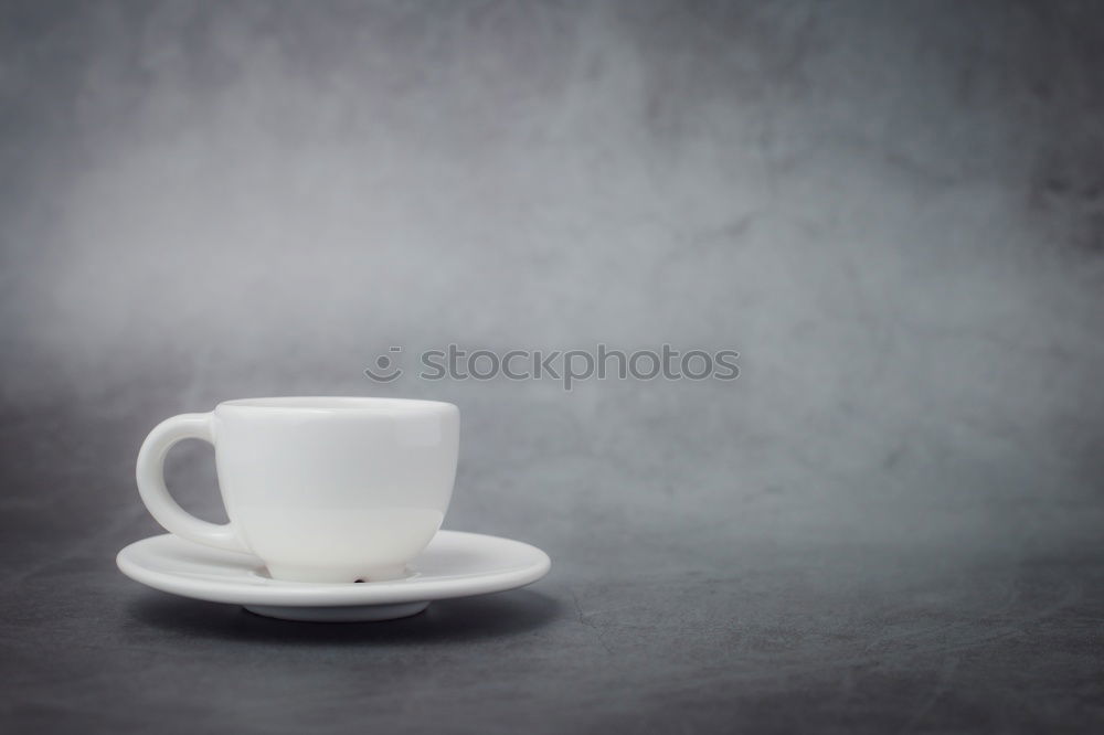 Similar – Image, Stock Photo Hand hold very small cup of coffee.