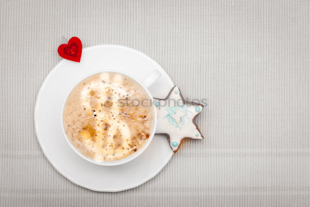 Similar – Christmas candy in the cup with snowflakes