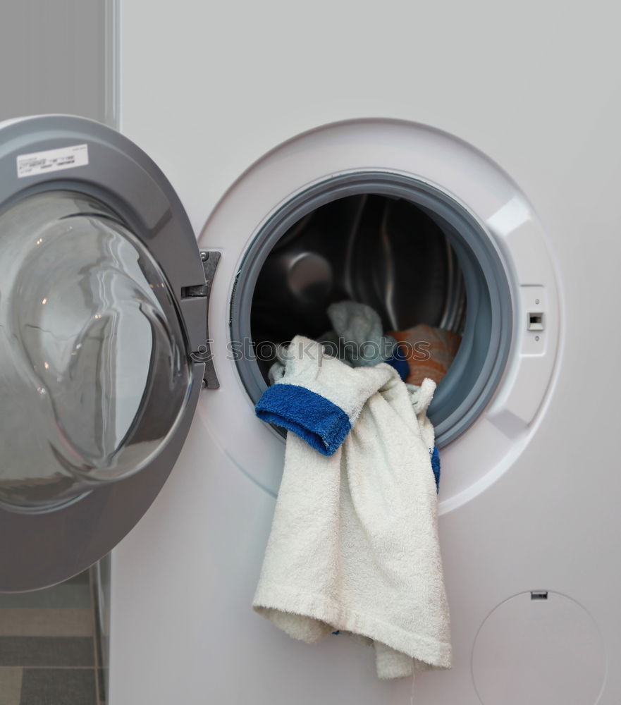 Similar – Face mask in a washing machine, hygiene, disinfection