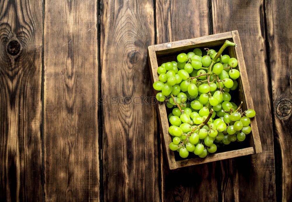 Similar – Bunch of grapes on table