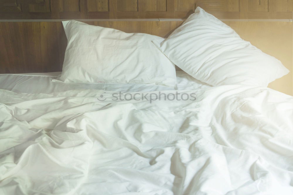 Similar – Image, Stock Photo A bed with two feet coming out of the sheets