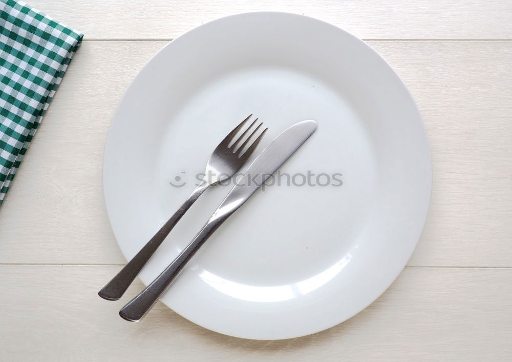 Similar – Festive golden cutlery knife and fork spoon in a white bottle