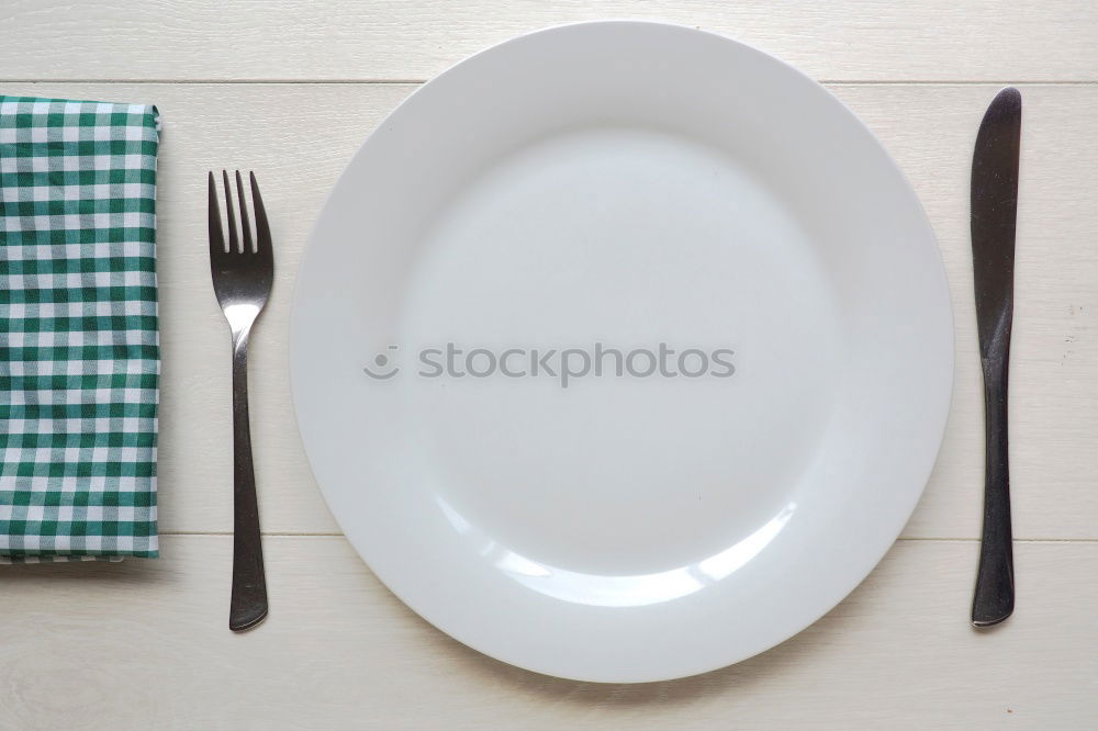 Similar – Image, Stock Photo The letters HUNGER on a plate with knife and fork and napkin and a glass of water