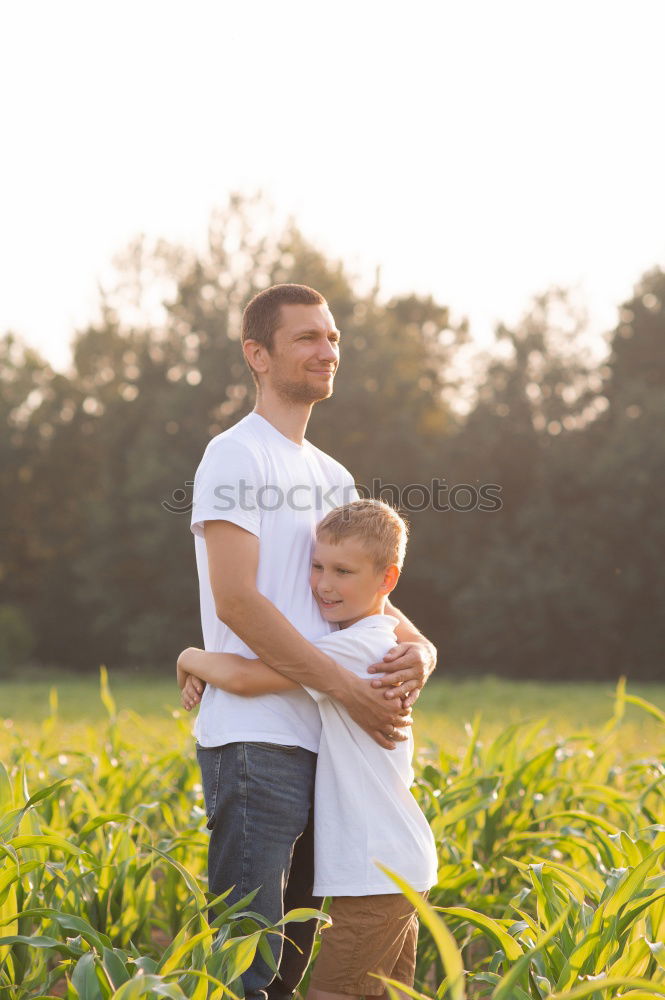 Similar – Image, Stock Photo happy father and daughter walking on summer meadow