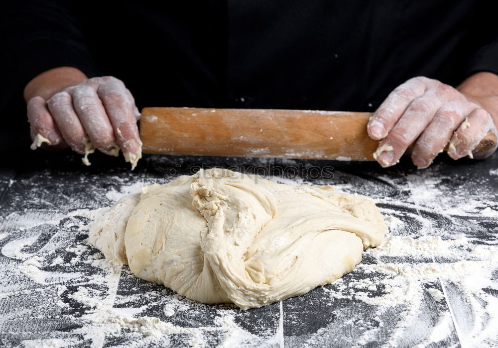 Similar – Image, Stock Photo spoon with white wheat flour in the male hands of a cook