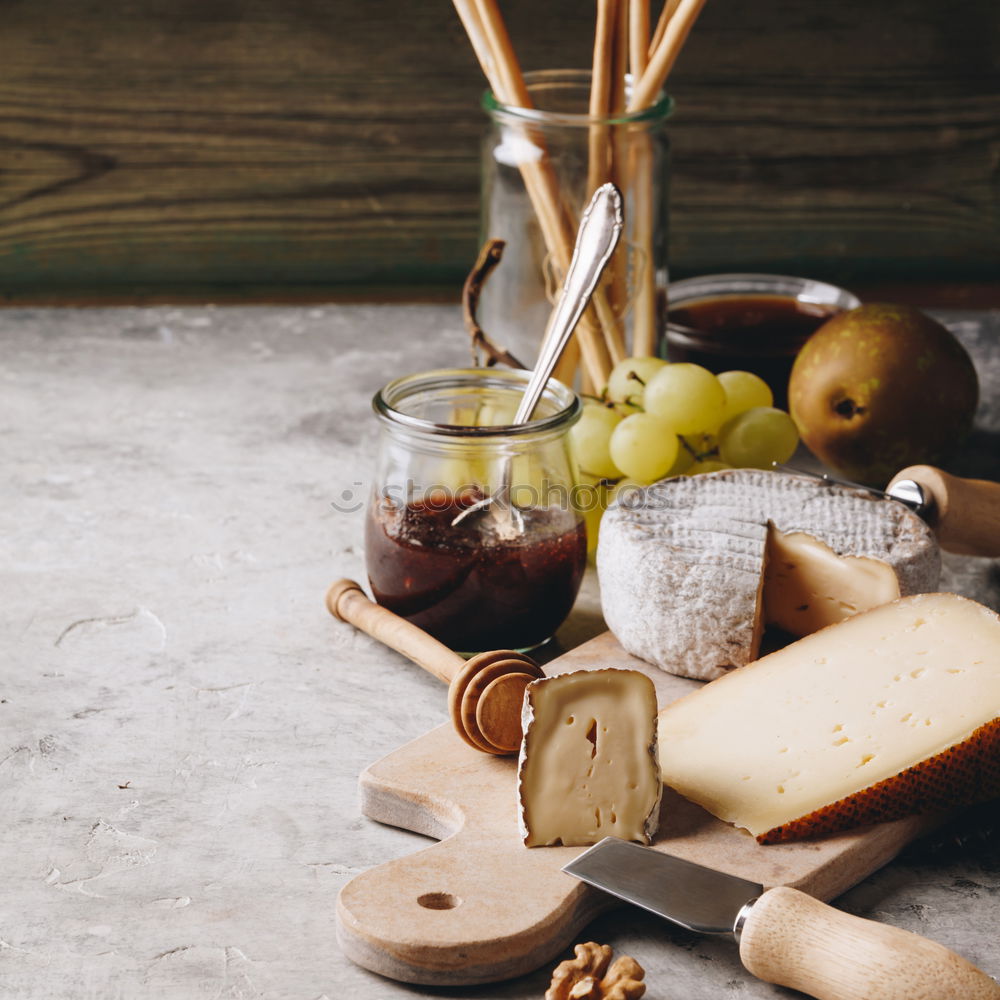 Similar – Image, Stock Photo Cheese with honey and berries