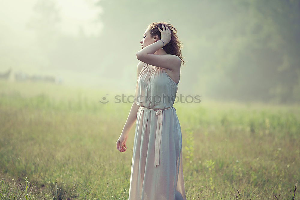 Similar – Image, Stock Photo Portrait of pretty woman smiling in nature