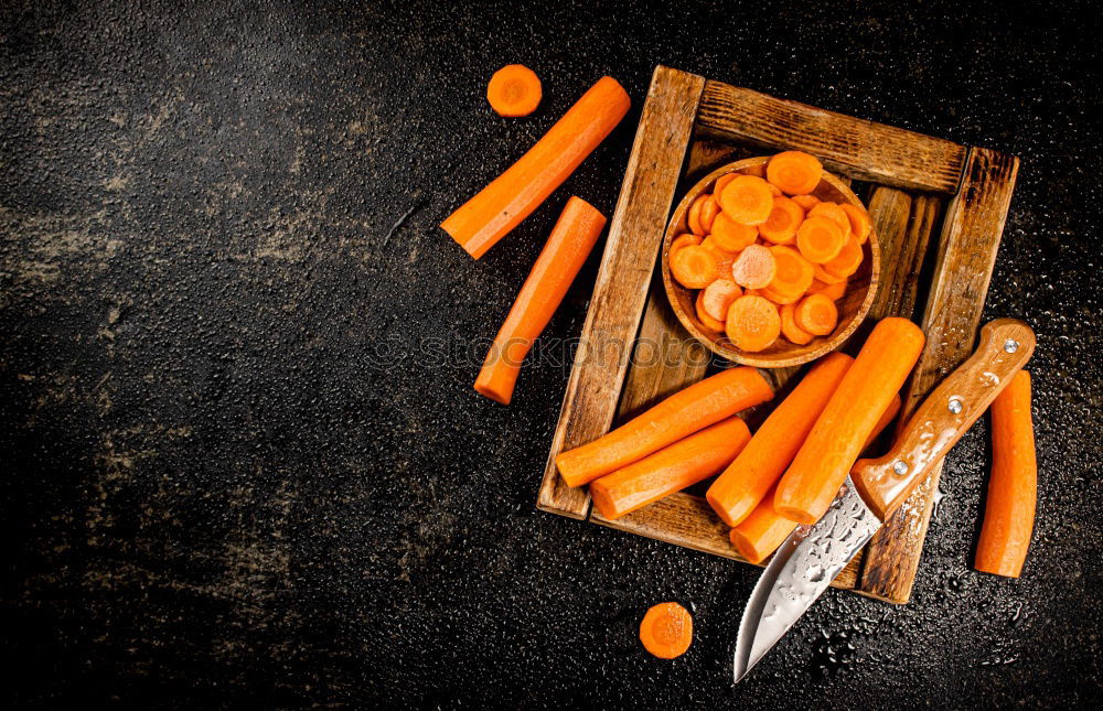 Similar – Ingredients for healthy soup or vegetables stew with orange color vegetarian ingredients : pumpkin, carrots, sweet potatoes , turmeric, ginger and chili on kitchen table background, top view.