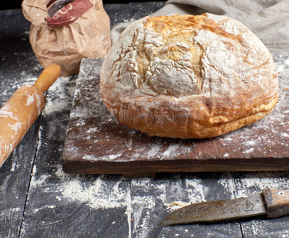 Similar – Image, Stock Photo baked round white wheat bread