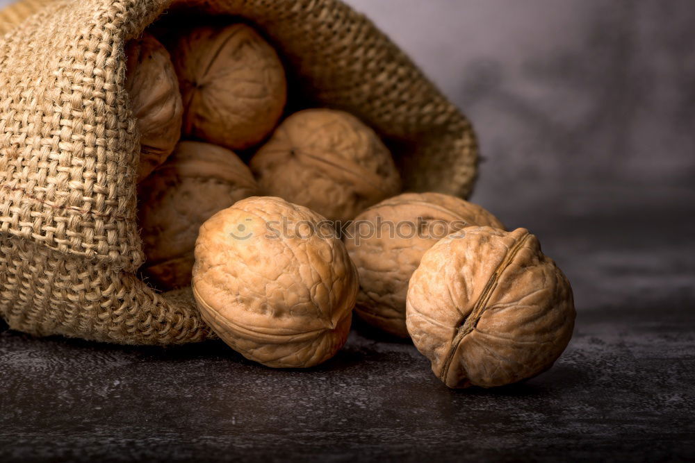 Similar – Image, Stock Photo Fresh walnuts with a nutcracker