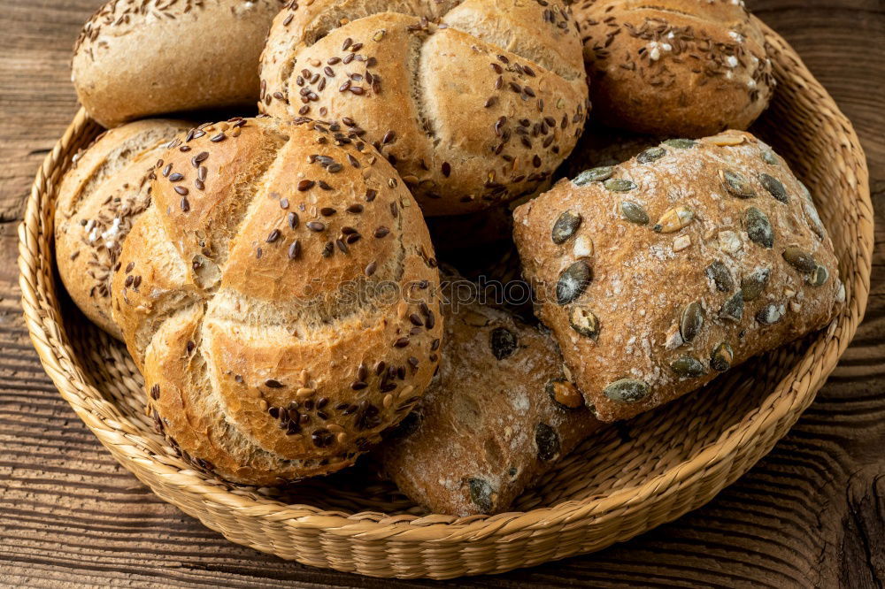 Similar – Many mixed breads and rolls.