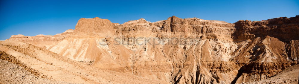 Similar – Image, Stock Photo Water near stone desert hills and blue sky