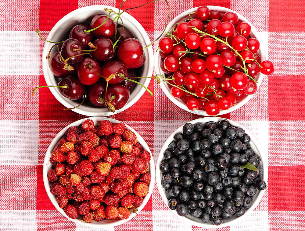 Similar – Image, Stock Photo Red and black raspberry and blueberry