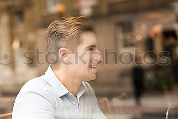 Similar – Attractive man sitting in a restaurant